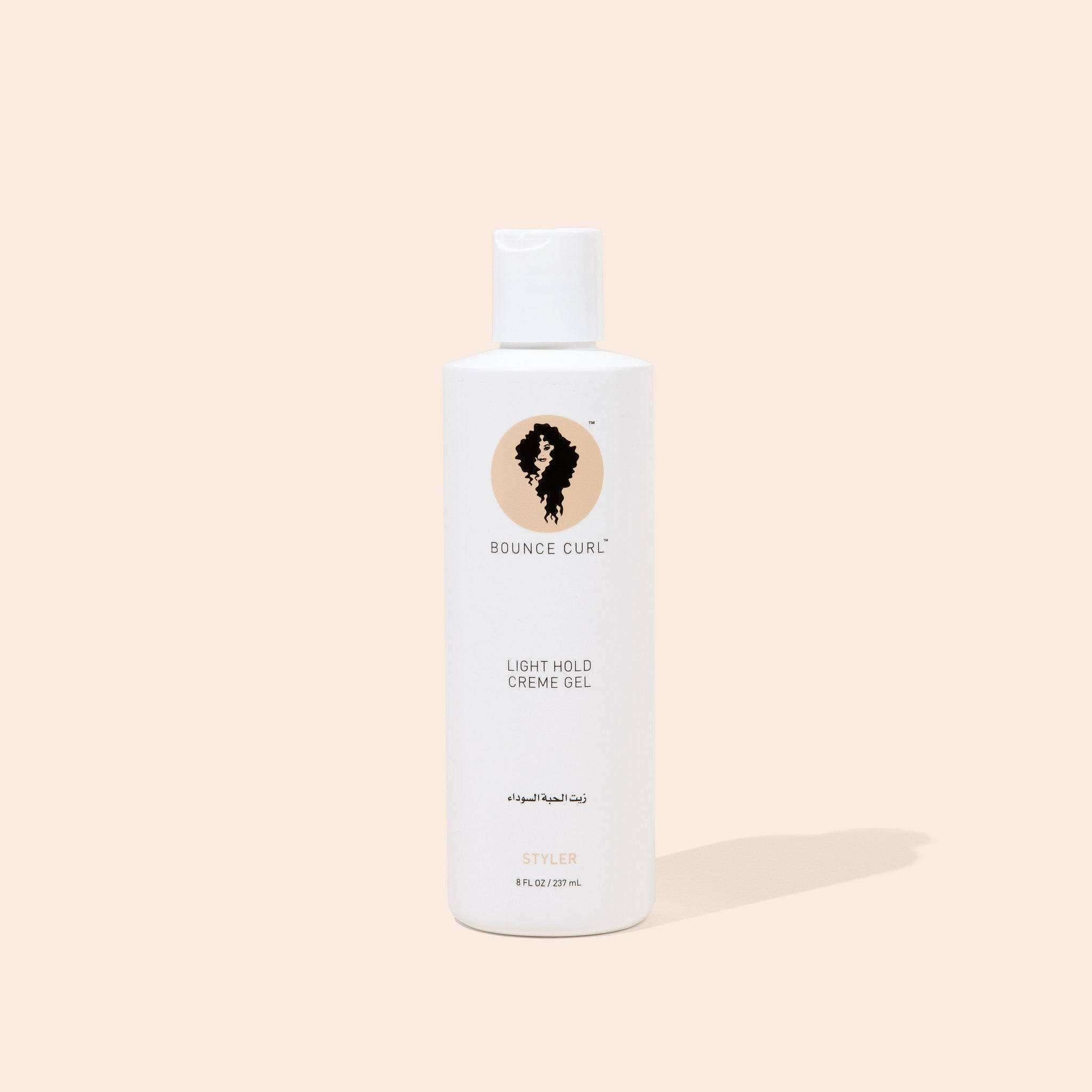 A bottle of Bounce Curl Light Hold Creme Gel with a white label and a logo depicting a curly hair icon. The cap is white, and the bottle contains 242ml of the product.