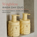 Two beige bottles of 'Weightless Wash Day Duo' with a neutral background
