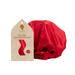 Red satin hair bonnet with packaging on a white background