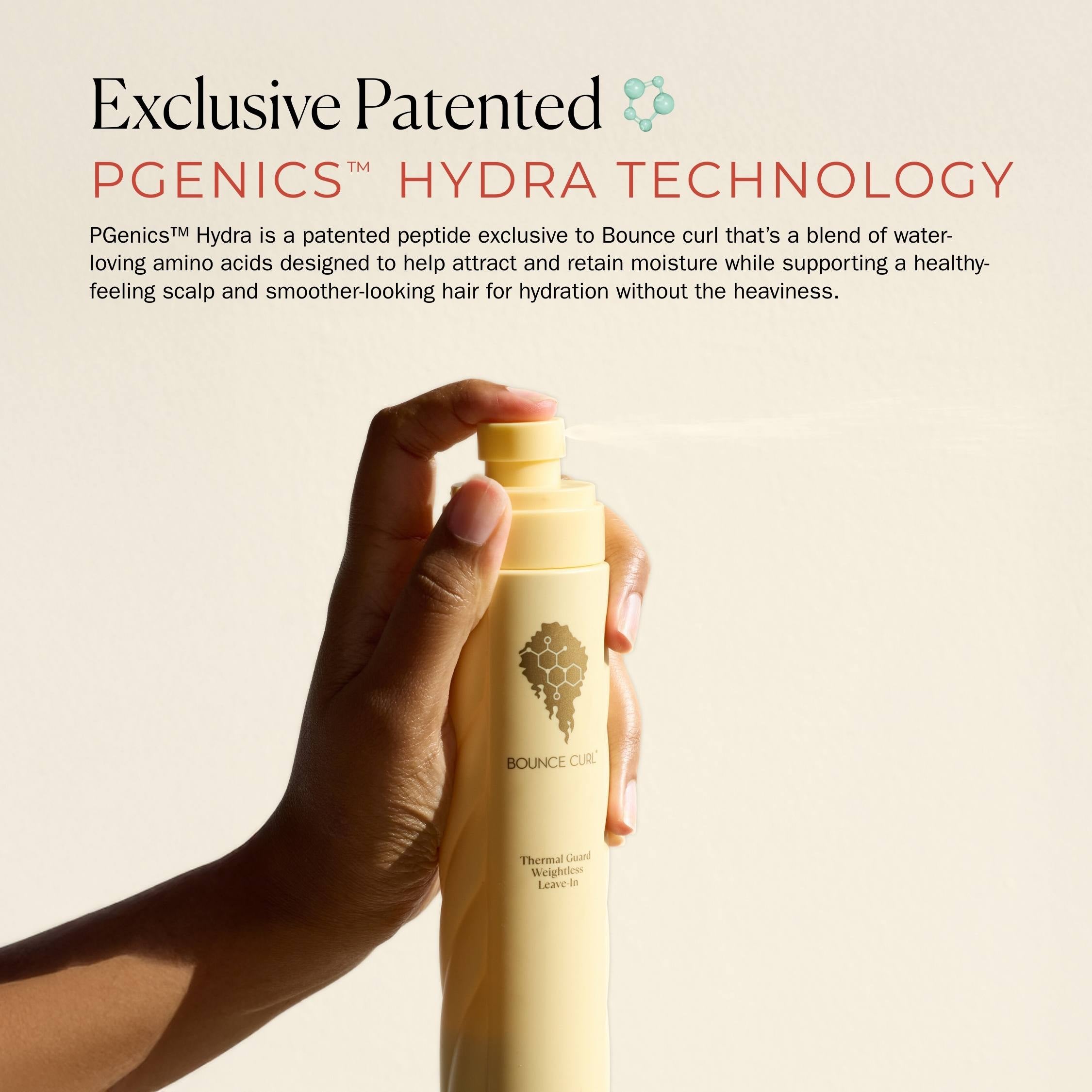 Hand holding a bottle of Bounce Curl product with PGenics Hydra Technology text on a beige background