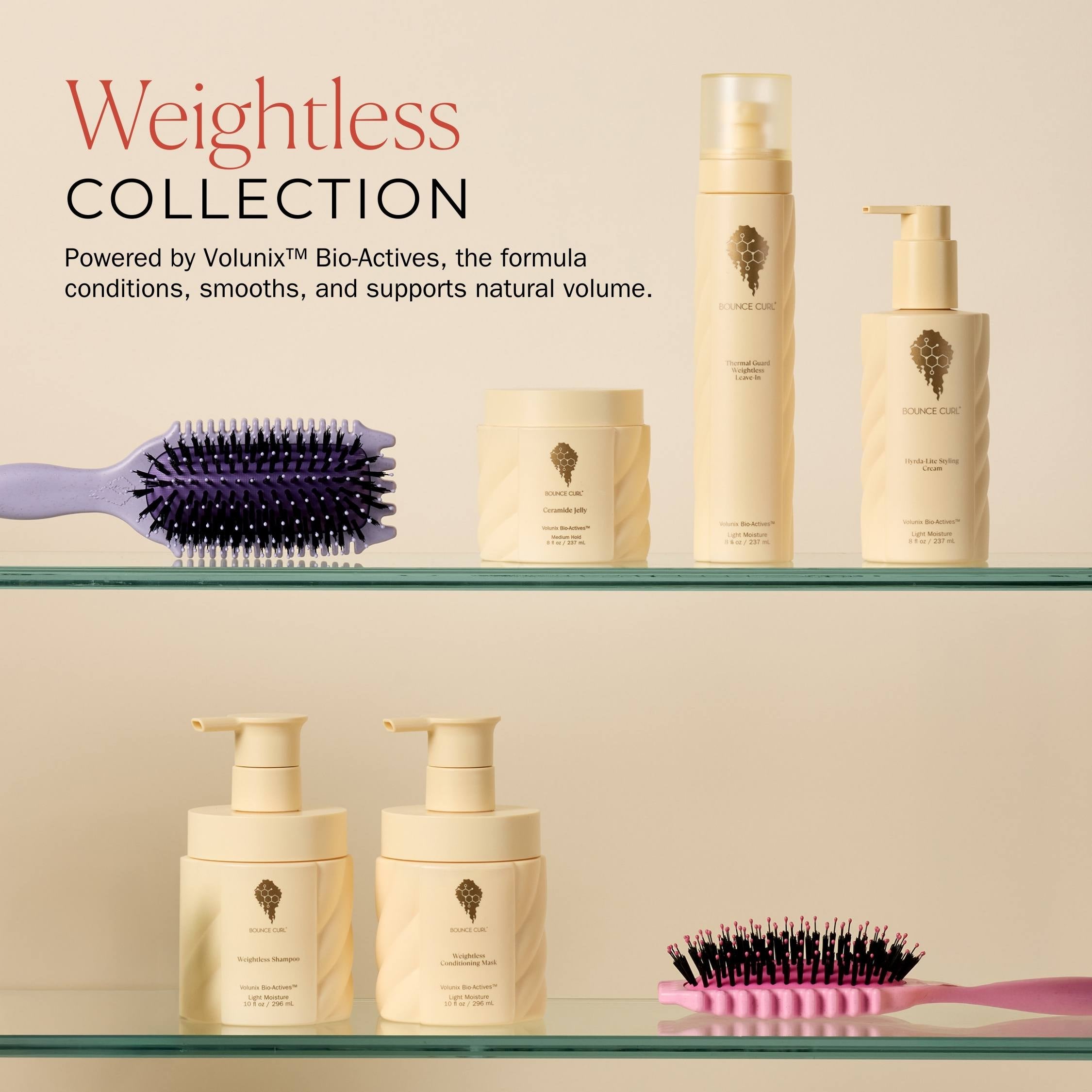 Hair care products and brushes on a glass shelf with 'Weightless Collection' text.