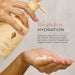 Hand holding a bottle of hair product with text about weightless hydration.