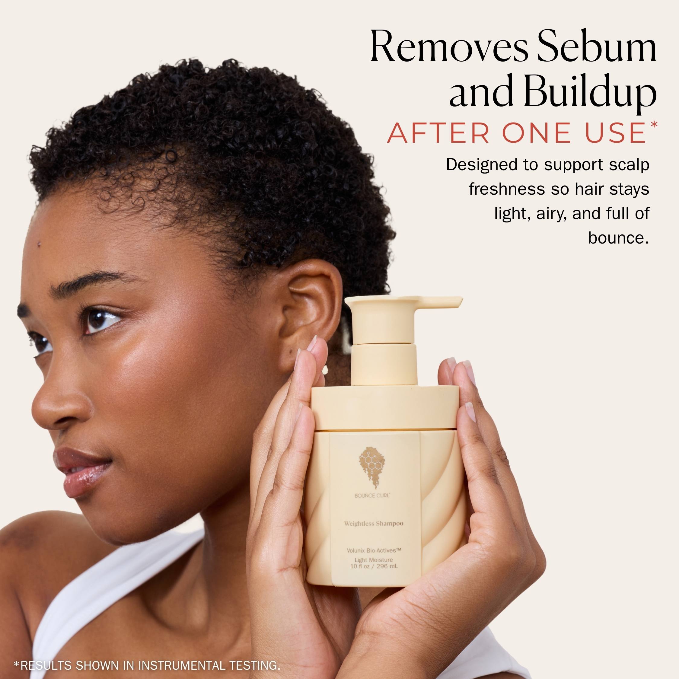 Woman holding a beige shampoo bottle with text about scalp care on a beige background