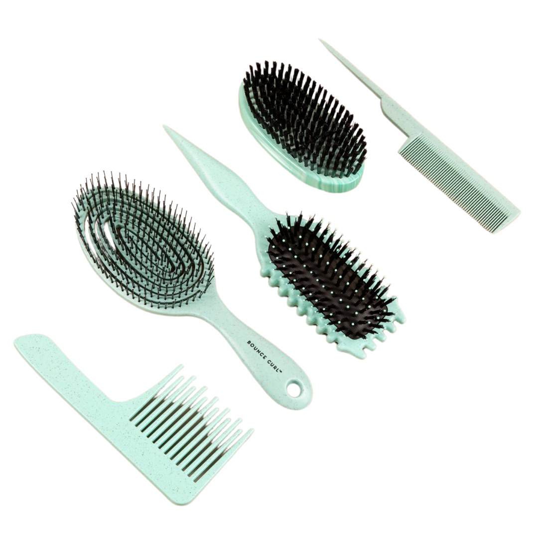 Bounce Curls volume comb, define edge lift brush, vegan soothing brush, and styling comb. 