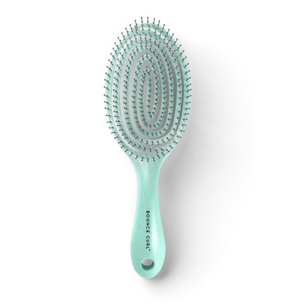 Brosse coiffante et démêlante