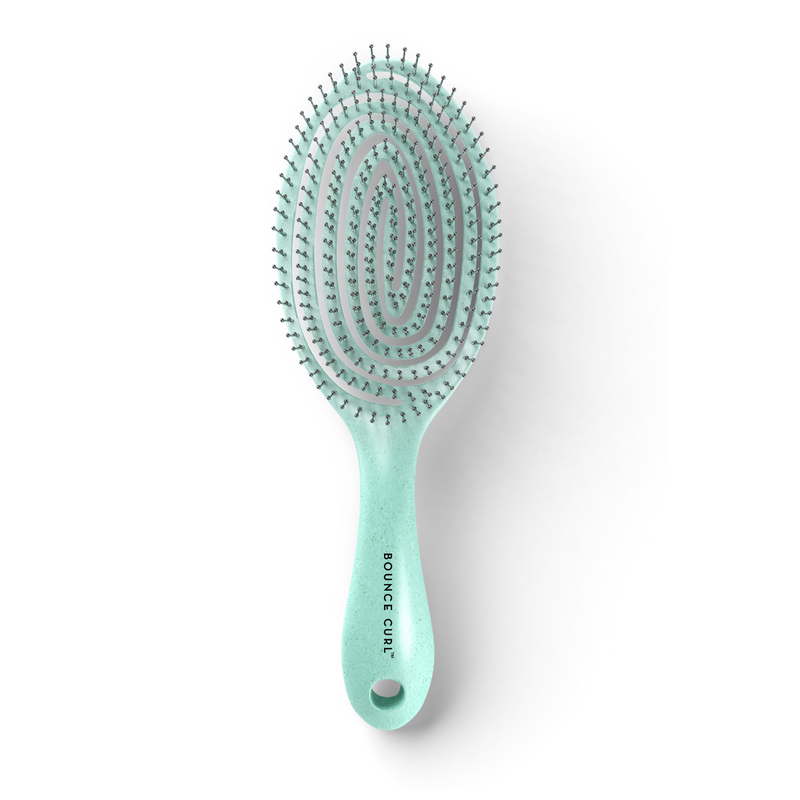 Brosse coiffante et démêlante